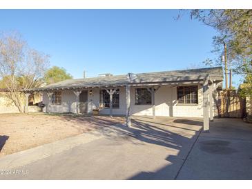 Ranch style home with carport and spacious yard at 3418 W Roma Ave, Phoenix, AZ 85017