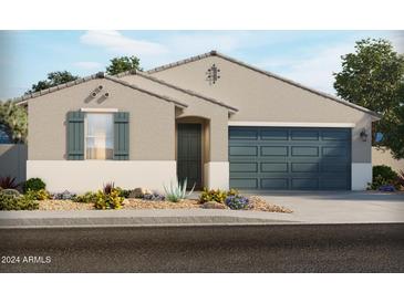 Charming single-story home with a two-car garage and landscaped front yard at 37374 W San Clemente St, Maricopa, AZ 85138