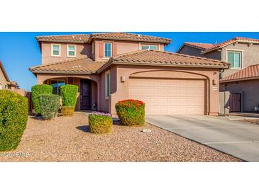 Two-story house with a two-car garage and well-maintained landscaping at 36909 N Coronado Ln, San Tan Valley, AZ 85140