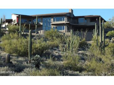 Modern desert home nestled on a hillside with stunning views at 8702 E Silver Saddle Dr, Carefree, AZ 85377