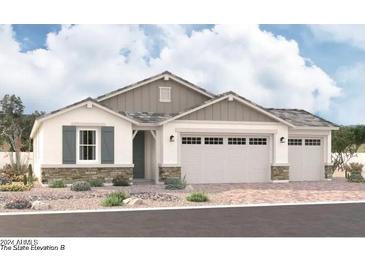 Charming two-story home with a three-car garage and inviting front porch at 12337 W Marguerite Ave, Avondale, AZ 85323