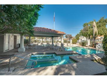 Community pool and spa area with covered seating at 1717 E Union Hills Dr # 1033, Phoenix, AZ 85024