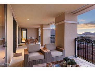 Spacious balcony with patio furniture and city views at 7181 E Camelback Rd # 702, Scottsdale, AZ 85251