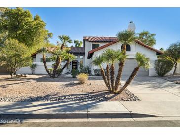 Beautiful Spanish style home with desert landscaping at 10587 E Caron St, Scottsdale, AZ 85258