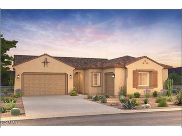 Single-story home with a two-car garage and desert landscaping at 24691 N 169Th Ave, Surprise, AZ 85387