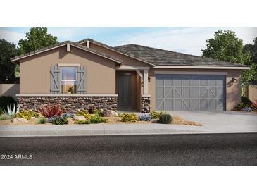 One-story home with stone accents and a two-car garage at 37033 W La Paz St, Maricopa, AZ 85138