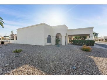 Front view of a single-story home with desert landscaping at 635 S 79Th Pl, Mesa, AZ 85208