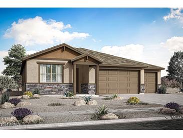 Single-story home with three-car garage and desert landscaping at 14740 W Tether Trl, Surprise, AZ 85387