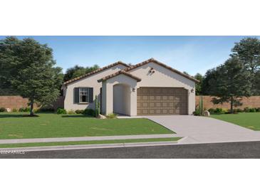 One-story home with a two-car garage and landscaped front yard at 15039 W Buckskin Trl, Surprise, AZ 85387