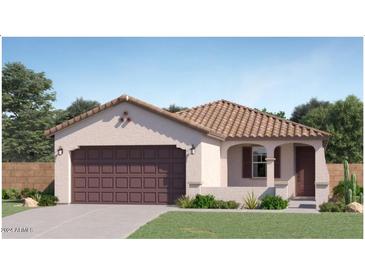 One-story home with brown garage door and Spanish-style tile roof at 16737 W Alameda Rd, Surprise, AZ 85387