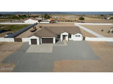 New construction home with a large backyard and rural views at 22538 W Pecan Rd, Buckeye, AZ 85326