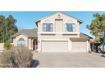 Two-story house with a two-car garage and a basketball hoop at 2832 E Laurel St, Mesa, AZ 85213
