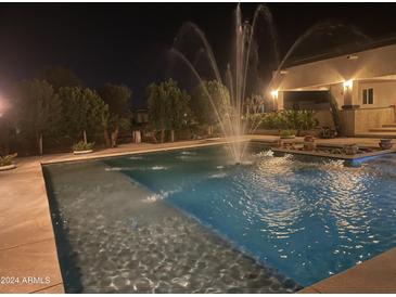 Night view of the refreshing pool and spa at 24201 N 181St Dr, Surprise, AZ 85387