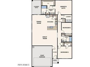 Two-bedroom, two-bath home with open floor plan, great room, and two-car garage at 1727 W Posada St, Coolidge, AZ 85128