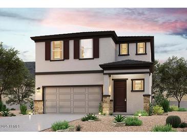 Two-story house with neutral color scheme and a two-car garage at 2624 E Dutchmans Trl, Apache Junction, AZ 85119