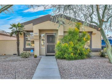 Inviting single-story home with landscaped front yard and walkway at 13261 W Countryside Dr, Sun City West, AZ 85375