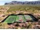 Tennis and pickleball courts with mountain backdrop at 3089 S Prospector Cir, Gold Canyon, AZ 85118