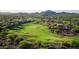 Aerial view of homes and a golf course at 3119 S Prospector Cir, Gold Canyon, AZ 85118