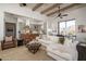Spacious living room featuring comfortable seating, large windows, and an open floor plan at 3119 S Prospector Cir, Gold Canyon, AZ 85118