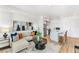 Open-concept living room, kitchen, and island with seating at 3131 N Central Ave # 3019, Phoenix, AZ 85012