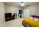 Bedroom with a bed, desk, and small fridge at 39995 N Prince N Ave, San Tan Valley, AZ 85140