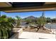 Landscaped front yard with desert plants and mountain views at 5434 E Lincoln Dr # 72, Paradise Valley, AZ 85253