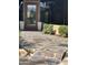 Inviting front entry with a stone walkway and lush landscaping at 10100 N 78Th Pl, Scottsdale, AZ 85258