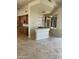 Kitchen with a curved breakfast bar and built-in wine rack at 10100 N 78Th Pl, Scottsdale, AZ 85258