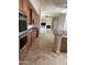 Open kitchen boasting stainless steel appliances and granite countertops at 10100 N 78Th Pl, Scottsdale, AZ 85258