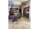 Open kitchen with island, breakfast nook, and plenty of cabinet space at 10100 N 78Th Pl, Scottsdale, AZ 85258