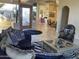 Open living room with access to dining and entry areas at 10100 N 78Th Pl, Scottsdale, AZ 85258