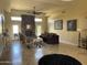 Elegant living room with a stone fireplace and comfortable seating at 10100 N 78Th Pl, Scottsdale, AZ 85258
