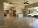 Open living area with tile floors and views of the kitchen at 10100 N 78Th Pl, Scottsdale, AZ 85258