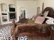 Main bedroom with fireplace and ensuite bathroom access at 10100 N 78Th Pl, Scottsdale, AZ 85258