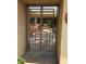 Elegant gated entry to a private backyard patio at 10100 N 78Th Pl, Scottsdale, AZ 85258