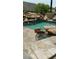 Relaxing pool area with waterfall and flagstone patio at 10100 N 78Th Pl, Scottsdale, AZ 85258