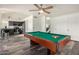 Game room with a pool table and access to kitchen at 7233 W Corrine Dr, Peoria, AZ 85381
