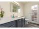 Bathroom features a single vanity, updated flooring, and backyard access at 7233 W Corrine Dr, Peoria, AZ 85381