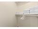 Linen closet with plenty of shelves for folded towels and hanging space at 7233 W Corrine Dr, Peoria, AZ 85381