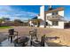 Backyard features a fire pit, patio, and view of the house at 7233 W Corrine Dr, Peoria, AZ 85381
