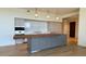 Modern kitchen with large island and stainless steel appliances at 4849 N Camelback Ridge Rd # B201, Scottsdale, AZ 85251