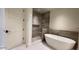 Spa-like bathroom with soaking tub and walk-in shower at 4849 N Camelback Ridge Rd # B201, Scottsdale, AZ 85251