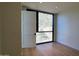 Bedroom with large window and mountain view at 4849 N Camelback Ridge Rd # B201, Scottsdale, AZ 85251