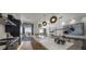 Modern kitchen with island and access to a patio at 37200 N Cave Creek Rd # 2120, Scottsdale, AZ 85262