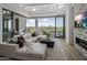 Living area with sectional sofa, fireplace and golf course views at 37200 N Cave Creek Rd # 2120, Scottsdale, AZ 85262