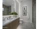 Contemporary bathroom with a walk-in shower and floating vanity at 37200 N Cave Creek Rd # 2120, Scottsdale, AZ 85262