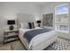 Bright bedroom with a queen-size bed and private balcony at 37200 N Cave Creek Rd # 2120, Scottsdale, AZ 85262