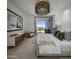 Spacious bedroom with large windows and access to a balcony at 37200 N Cave Creek Rd # 2120, Scottsdale, AZ 85262