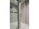 Modern shower with frameless glass enclosure and neutral tile at 37200 N Cave Creek Rd # 2120, Scottsdale, AZ 85262