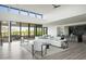 Modern great room with clerestory windows, fireplace, wet bar, wine cellar at 37200 N Cave Creek Rd # 1009, Scottsdale, AZ 85262